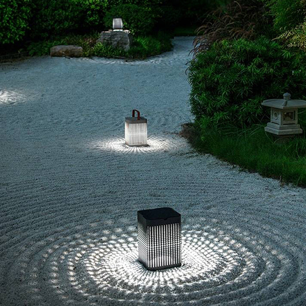 Orr solar outdoor floor lamps on zen garden.