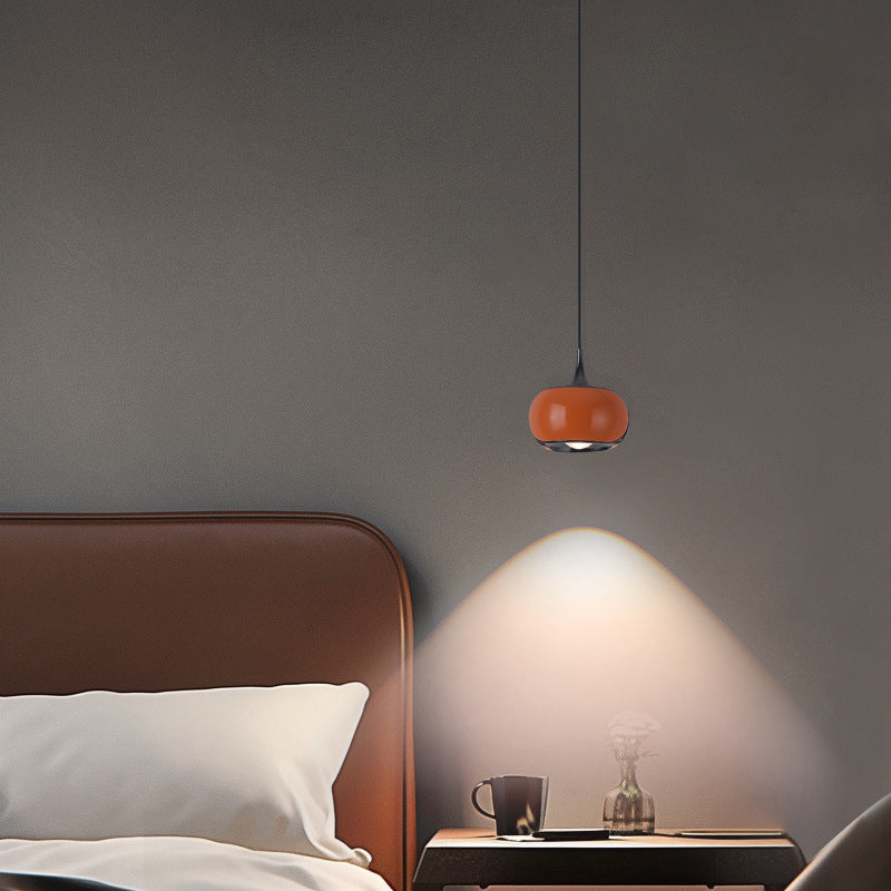 Hailie Retro Nordic Pendant Light illuminating a bedroom setting