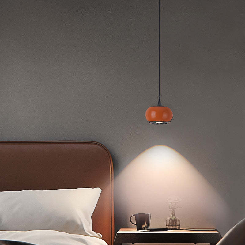 Hailie Retro Nordic Pendant Light illuminating a bedroom setting