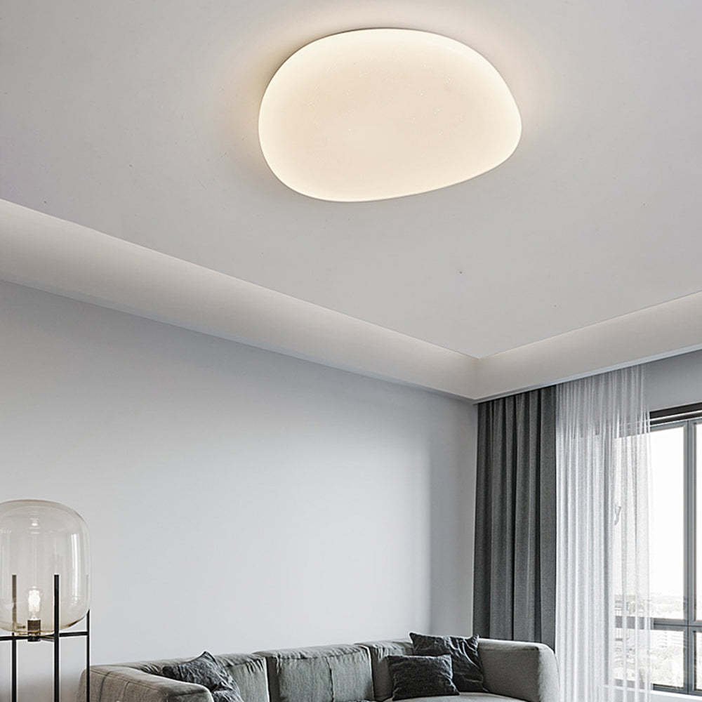 Quinn Modern Ceiling Light illuminating living room