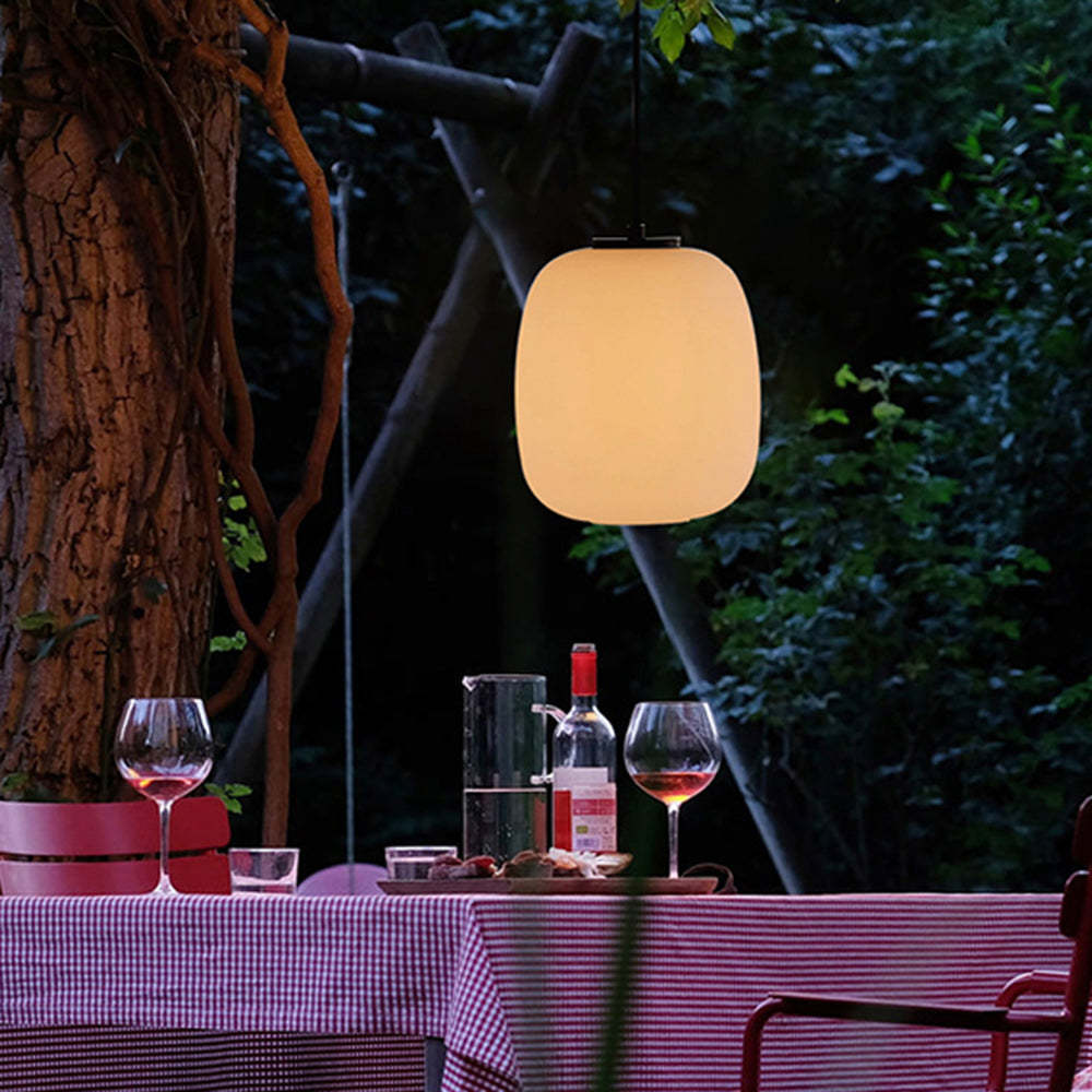 Alessio outdoor pendant light over patio table.