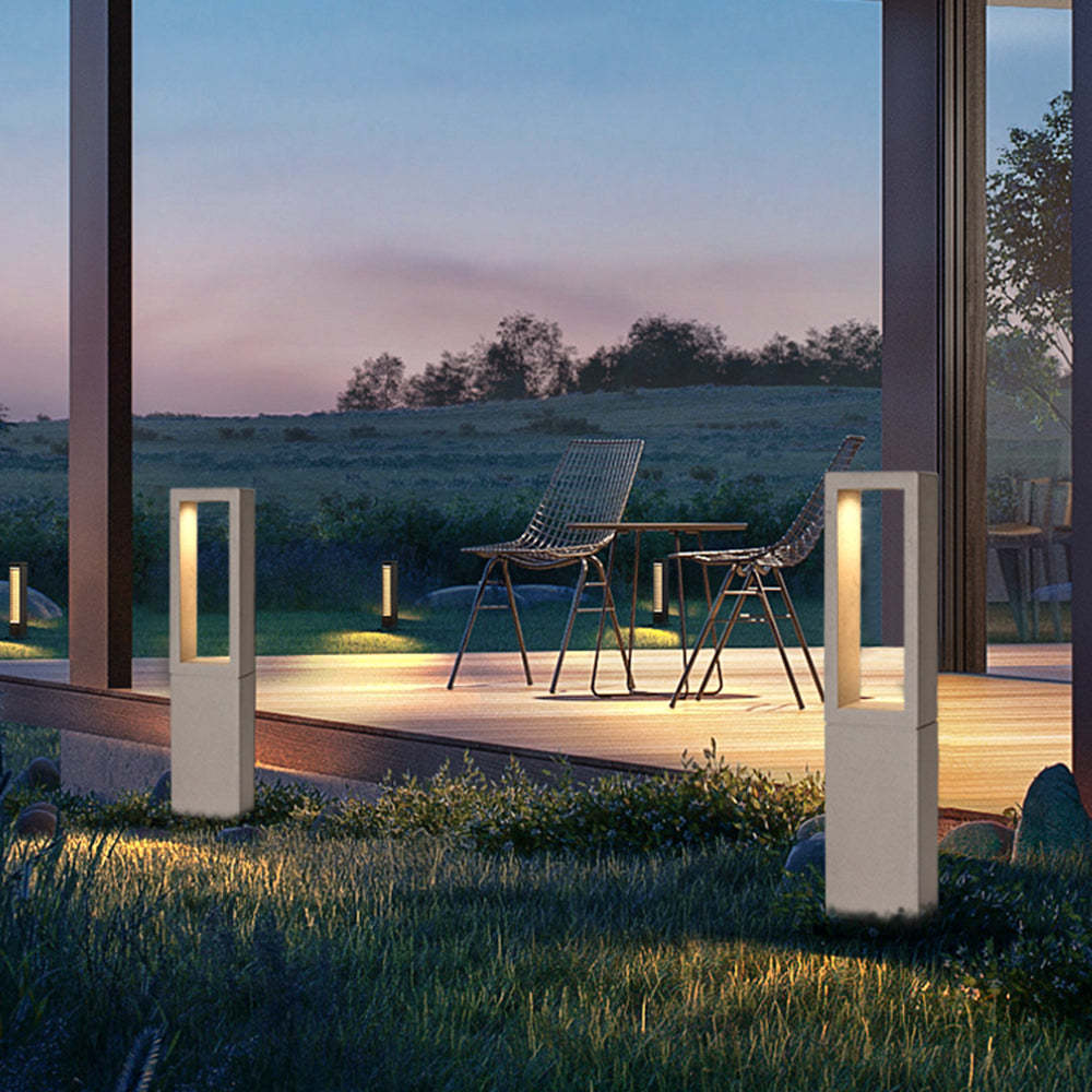 Pena Outdoor Path Lights illuminate patio at dusk