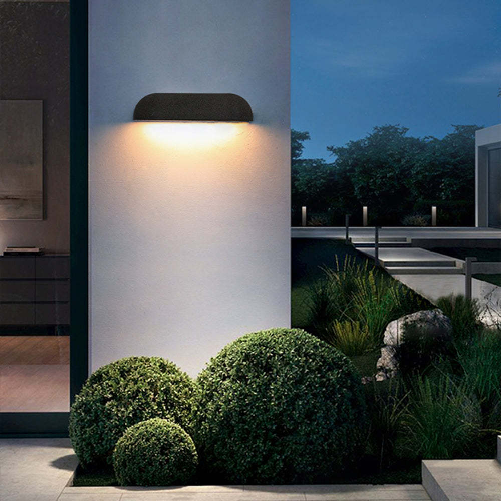Orr Outdoor Wall Lamp illuminating garden at night