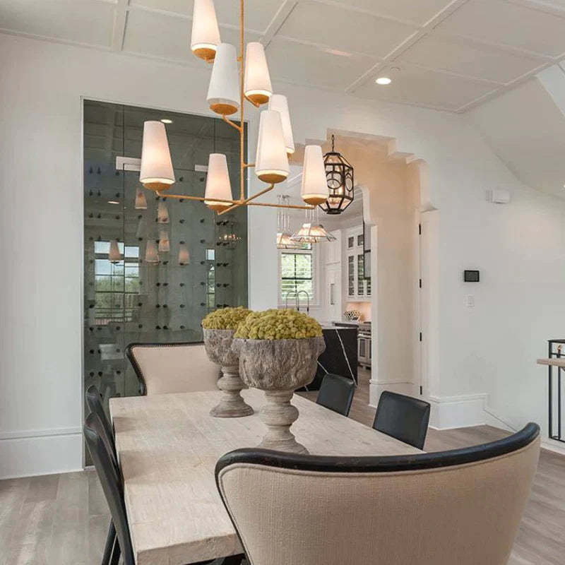 Alessio chandelier lighting above dining table.