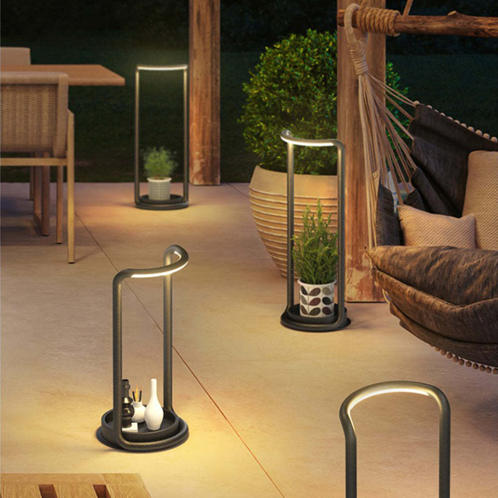 Lassola Orr LED Outdoor Floor Lamp illuminating outdoor space