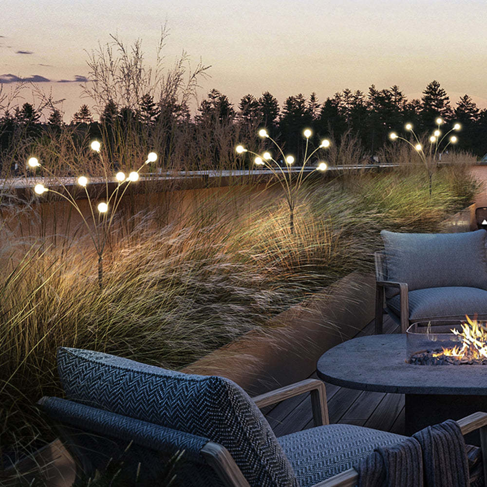 Orr Firefly outdoor lights illuminate patio at dusk