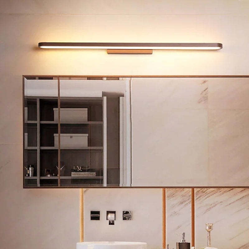 Metal wall lamp over mirror, modern bathroom lighting