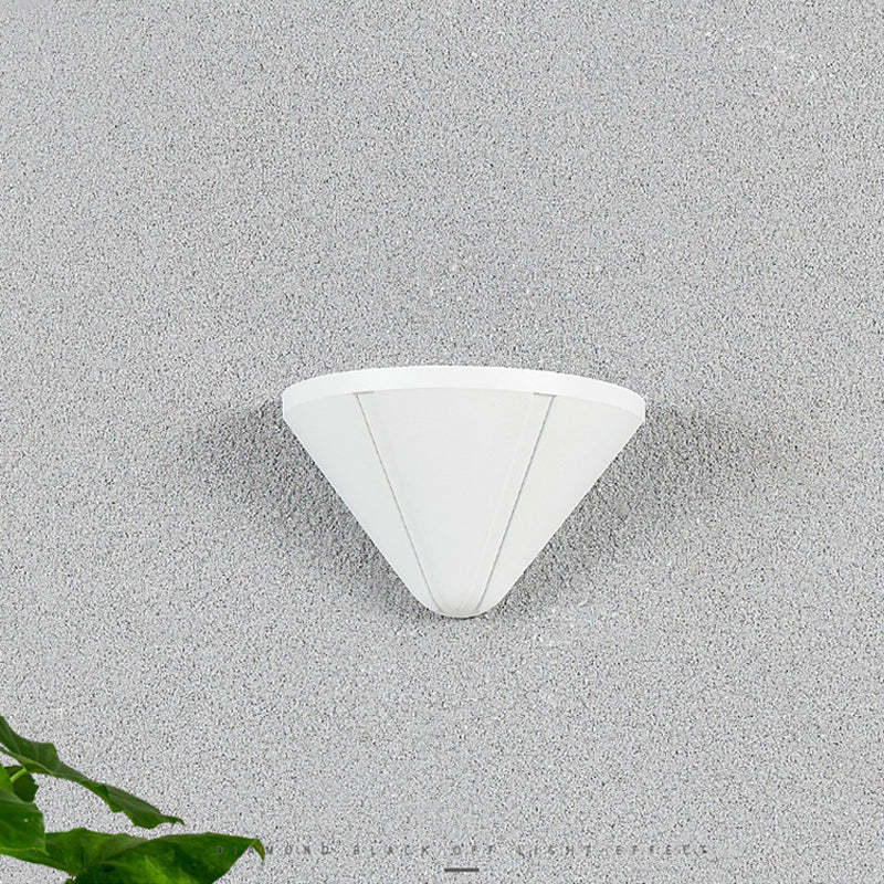 Modern cone LED outdoor wall lamp on gray wall