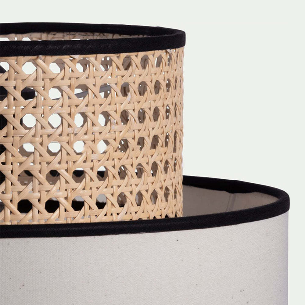 Close-up of Ritta pendant light shade detail: rattan and fabric