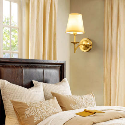 Bedroom with gold Alessio rustic LED wall lamp