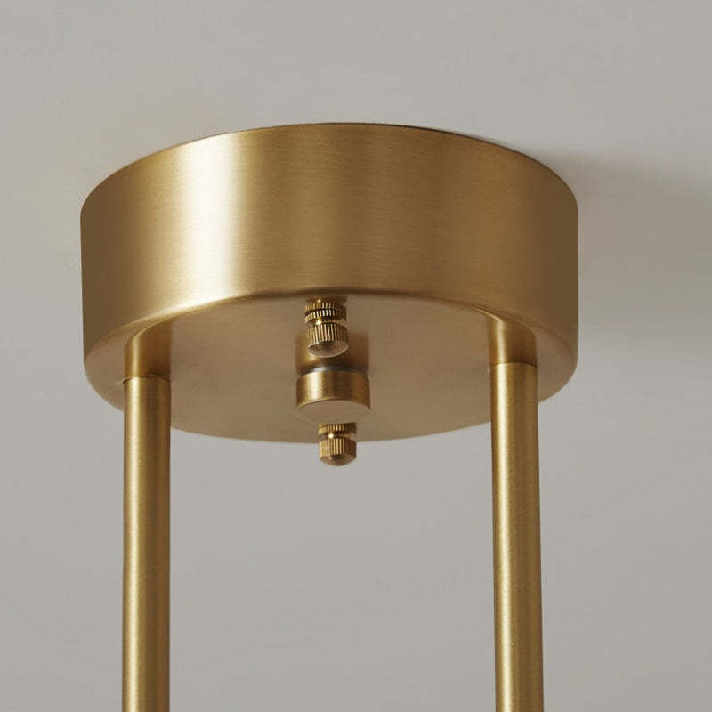 Close-up of Valentina pendant light canopy, brass finish