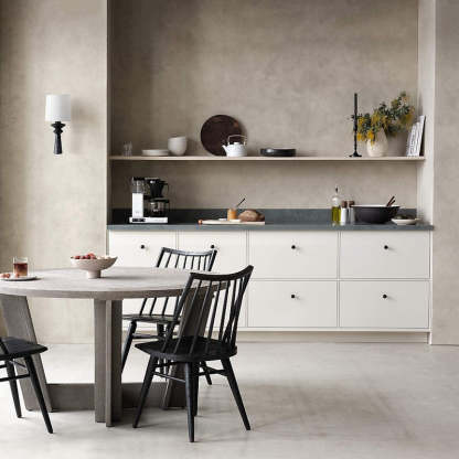 Alessio wall lamp in modern dining room.