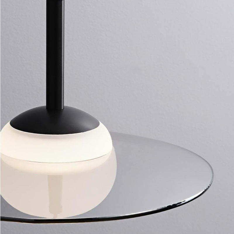 Modern Cairns pendant light with glass and black design