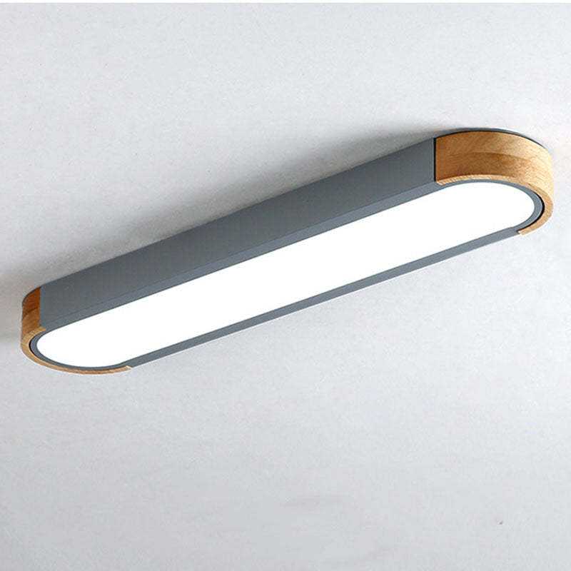Gray Morandi ceiling light with wood trim. Modern bedroom lighting.