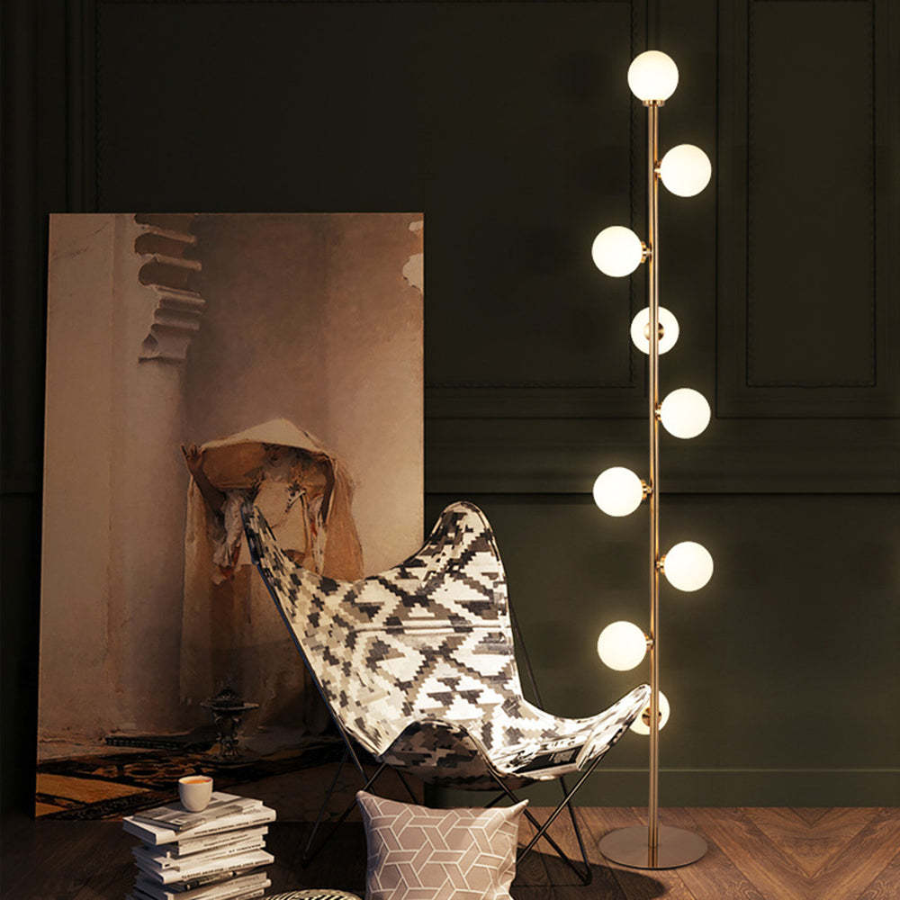 Modern living room with Valentina floor lamp and designer chair