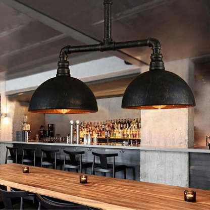 Alessio industrial pendant light over bar. Dome metal lighting fixture.