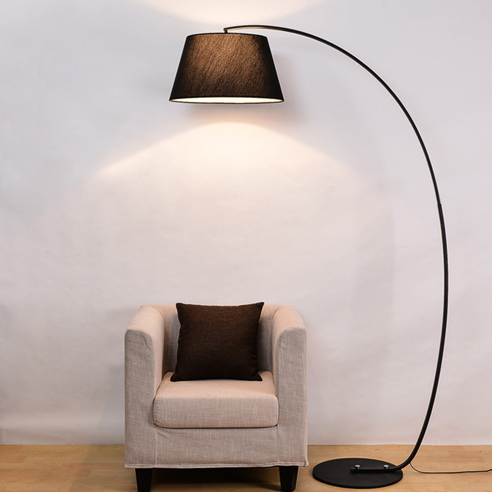 Salgado Arc Floor Lamp next to armchair