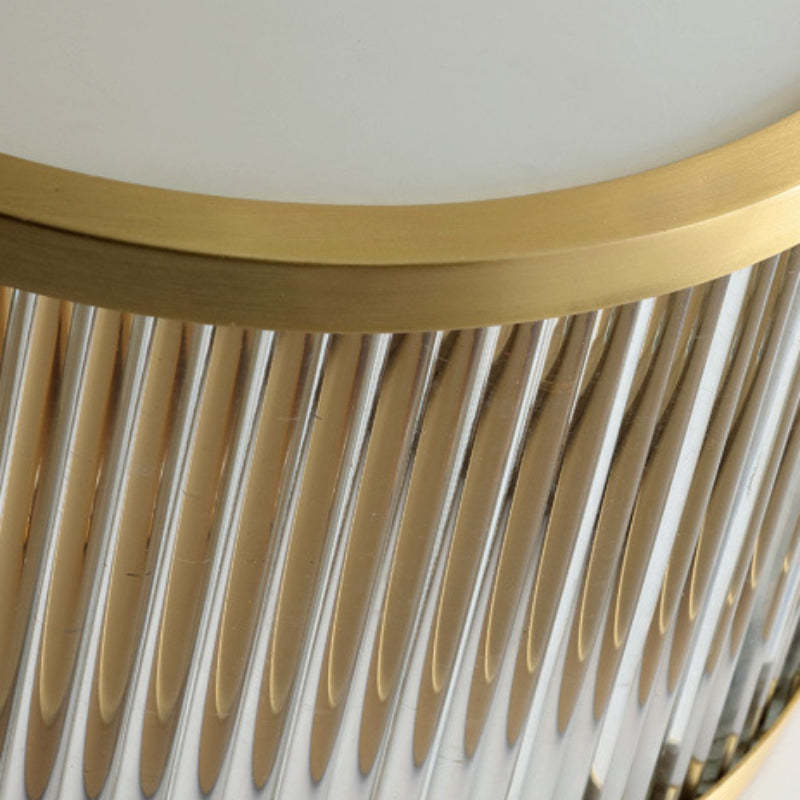 Retro flush mount ceiling light with gold trim and textured glass.