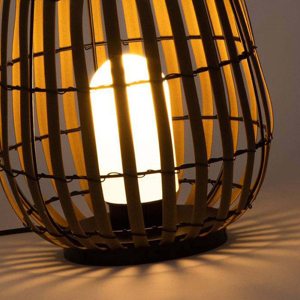 Muto Retro Lantern floor lamp close-up, glowing warm light