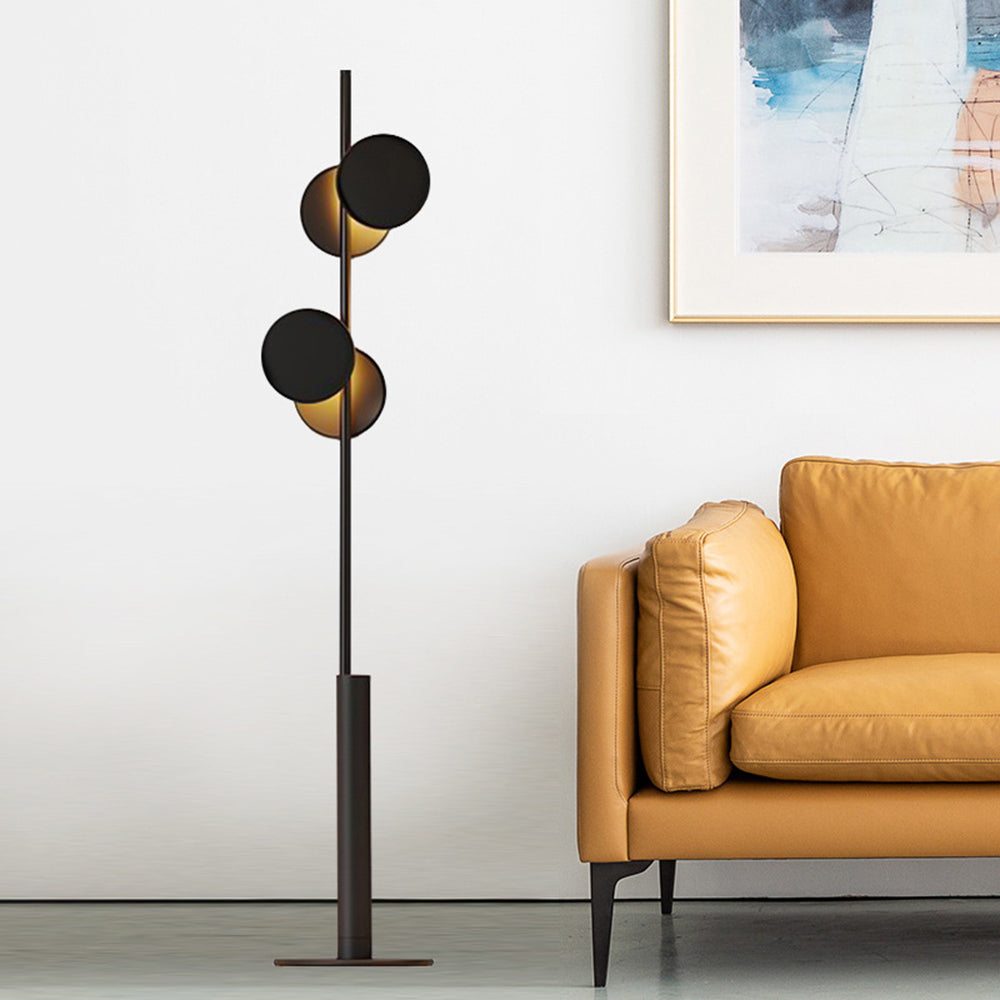 Modern floor lamp in living room with yellow sofa