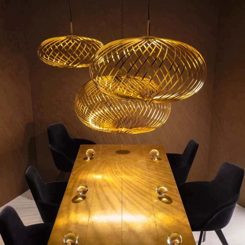 Gold Quinn Industrial Pendant Lights over Dining Table