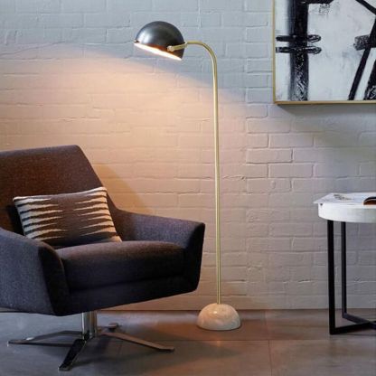 Eryn Floor Lamp in a bedroom setting with armchair and side table