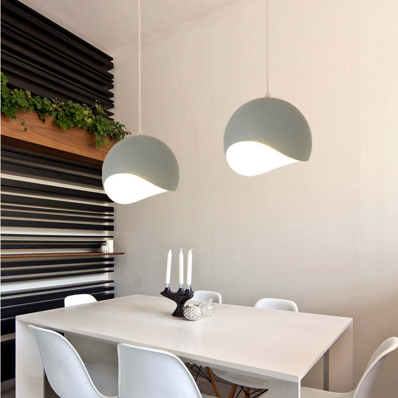 Leilani Globe Pendant Lights above a dining table