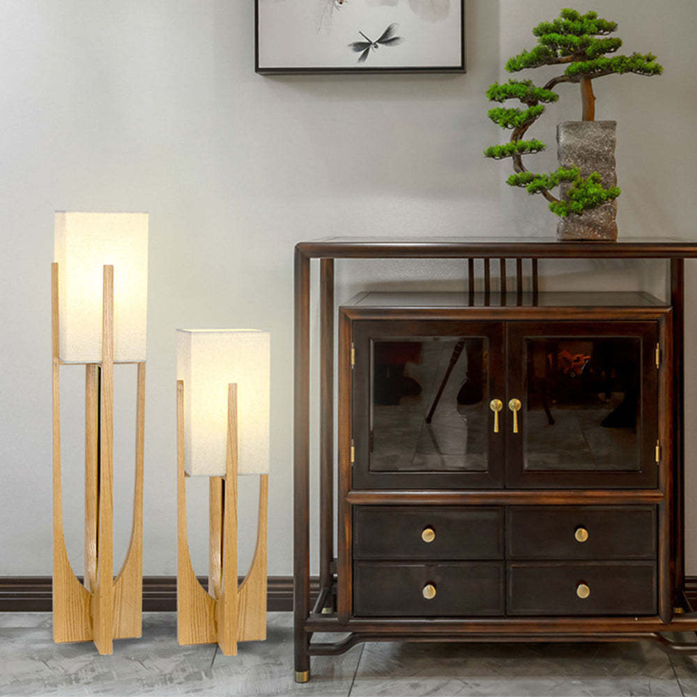 Ozawa wood floor lamp near cabinet.