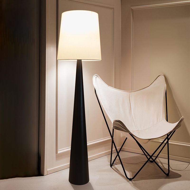 Eryn Floor Lamp: Nordic style fabric shade and cone base.