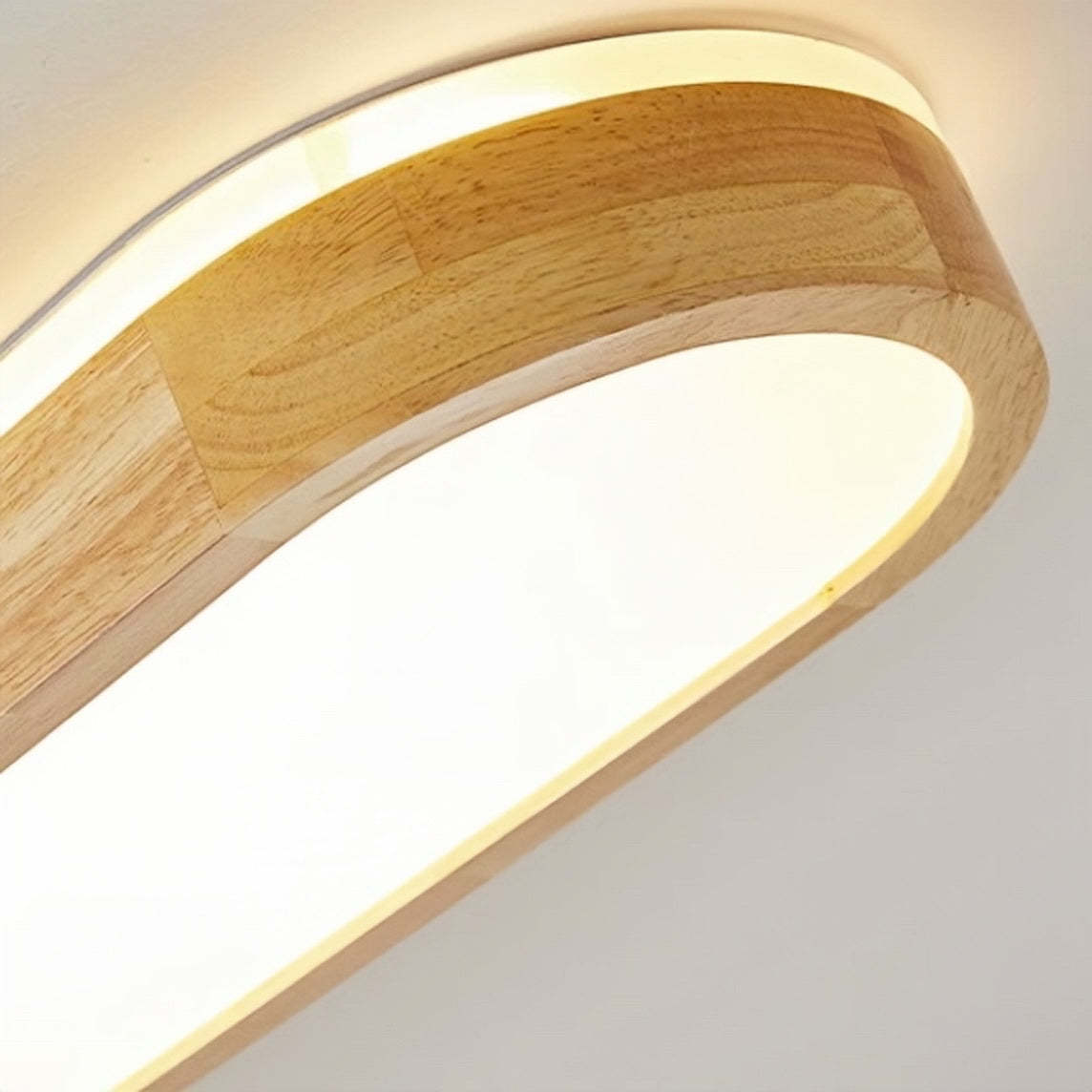 Close-up of Ozawa Oval LED Ceiling Light's wood and acrylic detail