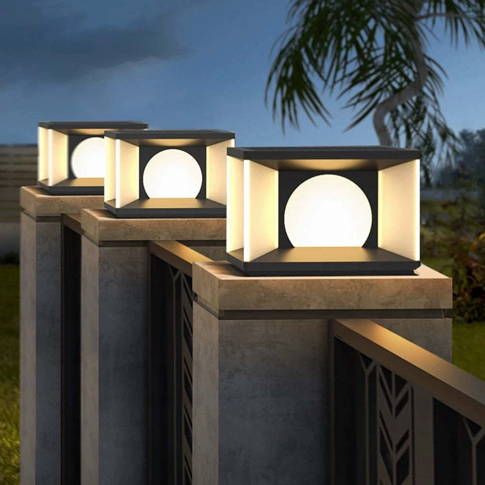 Modern outdoor light post, square lamps on a fence, night scene