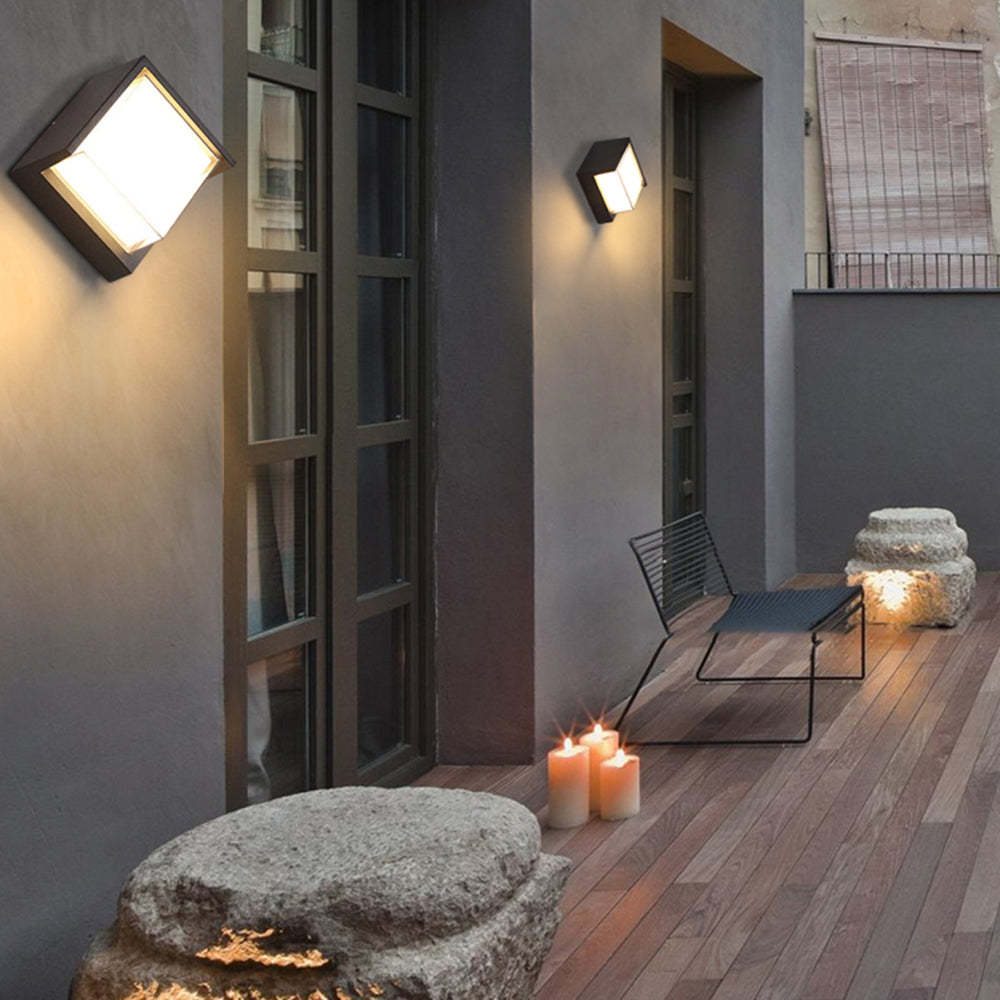 Orr Modern Outdoor Wall Lamp illuminating a patio