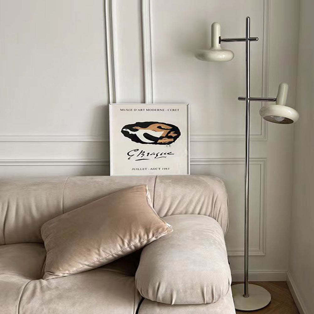 Carins Floor Lamp next to sofa and art print