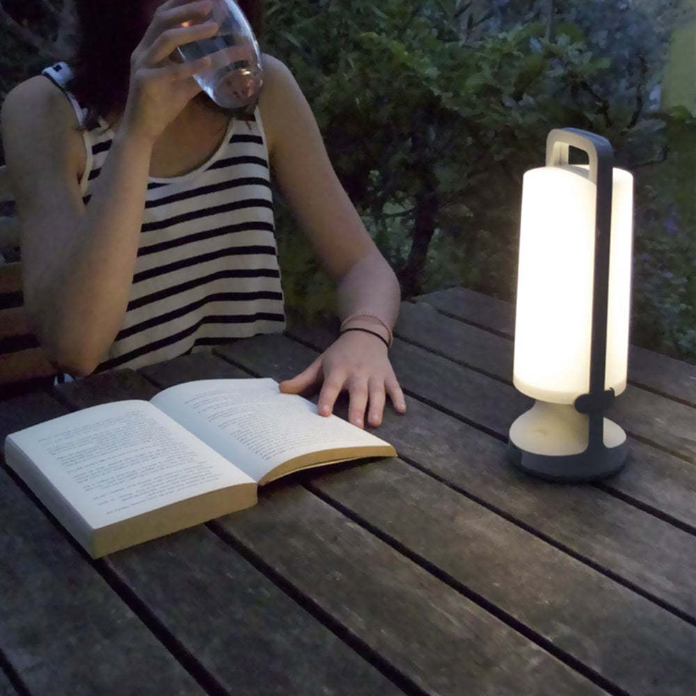Orr LED Solar Lamp on table, reading