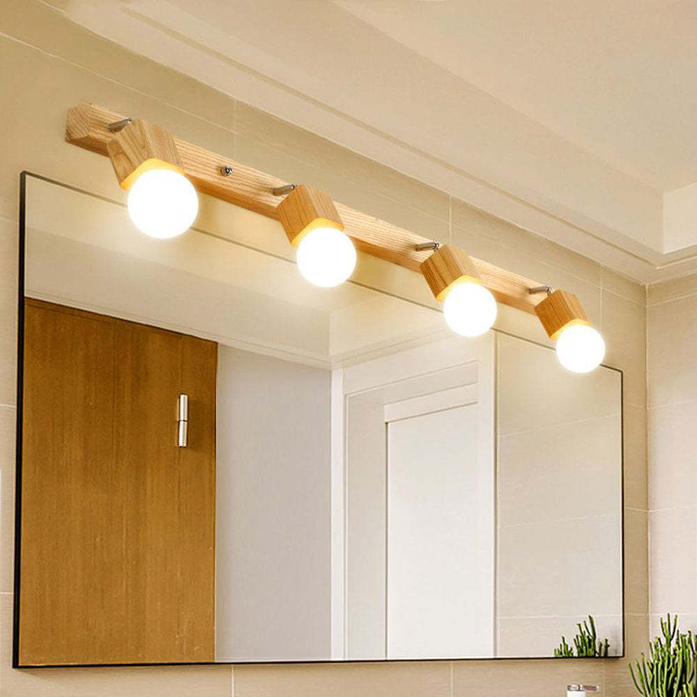 Modern wood and metal vanity light above mirror