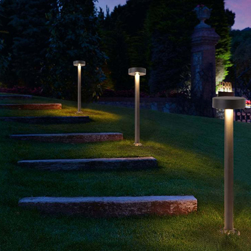 Pena Outdoor Path Lights illuminating a garden stairway at night