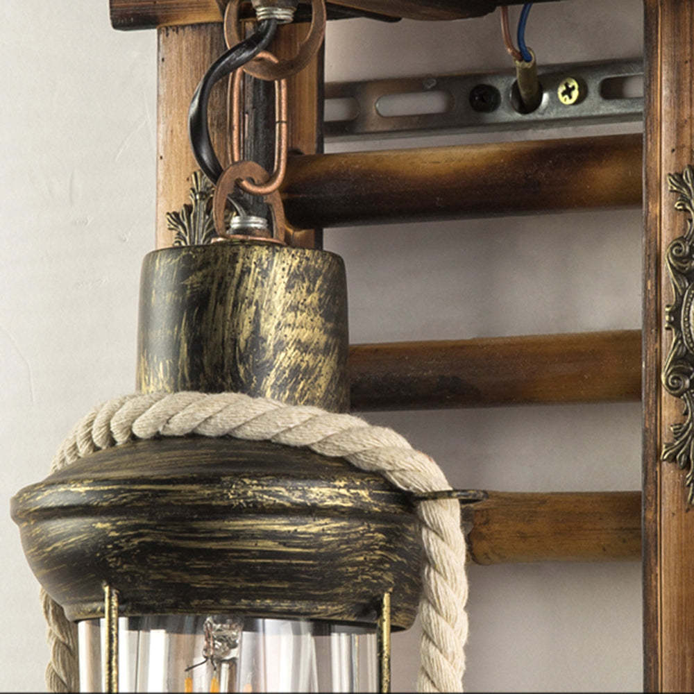 Rustic lantern wall lamp with rope accent.