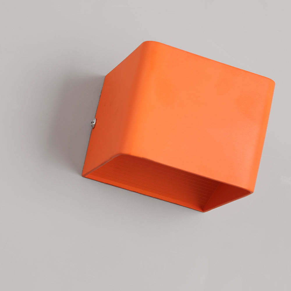 Orange Orr Wall Lamp on light gray wall
