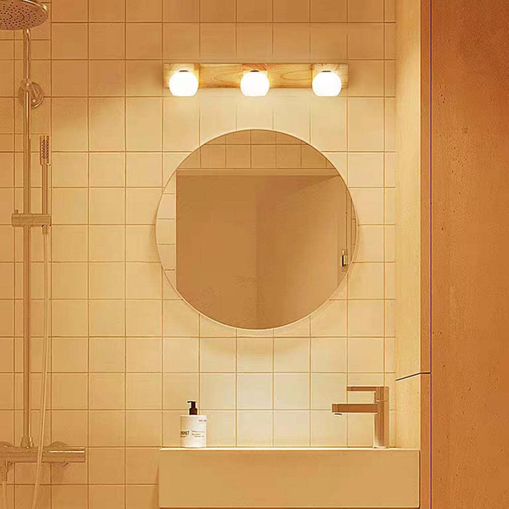 Ozawa Wooden Ball Vanity Lamp in bathroom setting