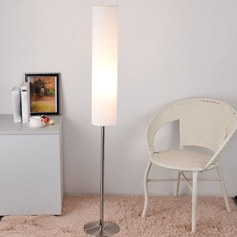 Modern floor lamp in a living room setting, Renée style