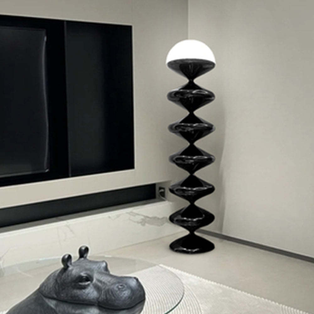 Modern black floor lamp in a living room setting