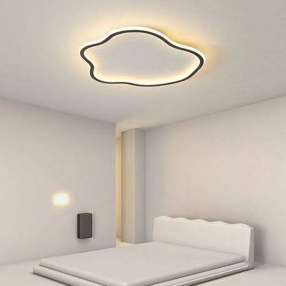 Cloud-shaped Quinn ceiling light in a bedroom, modern lighting