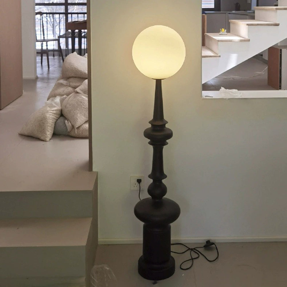 Salgado Retro Floor Lamp illuminating a modern interior - Lassola