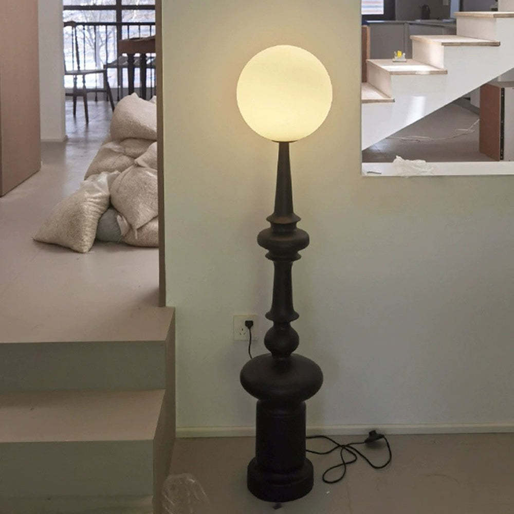 Salgado Retro Floor Lamp illuminating a modern interior - Lassola