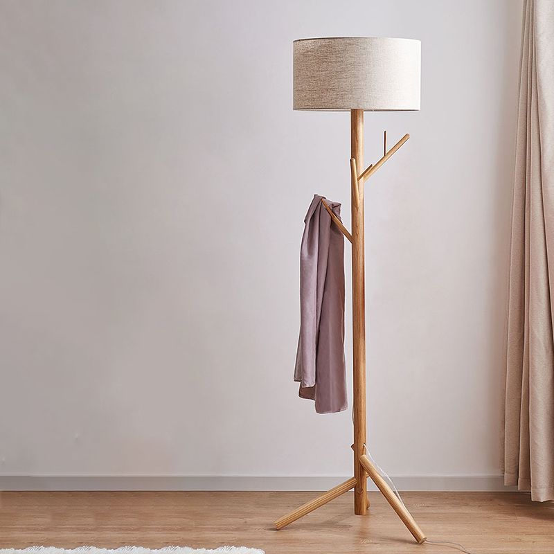 Fabric and wooden Muto floor lamp.