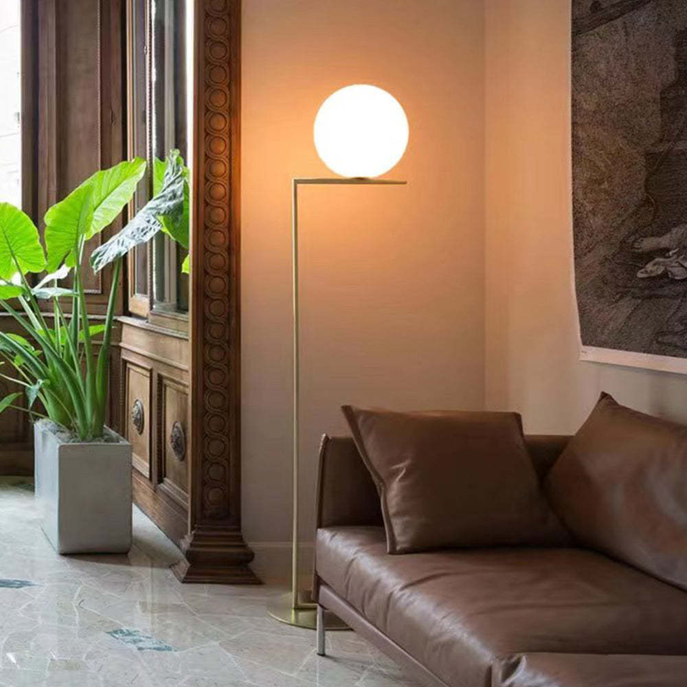 Valentina modern brass floor lamp in a living room