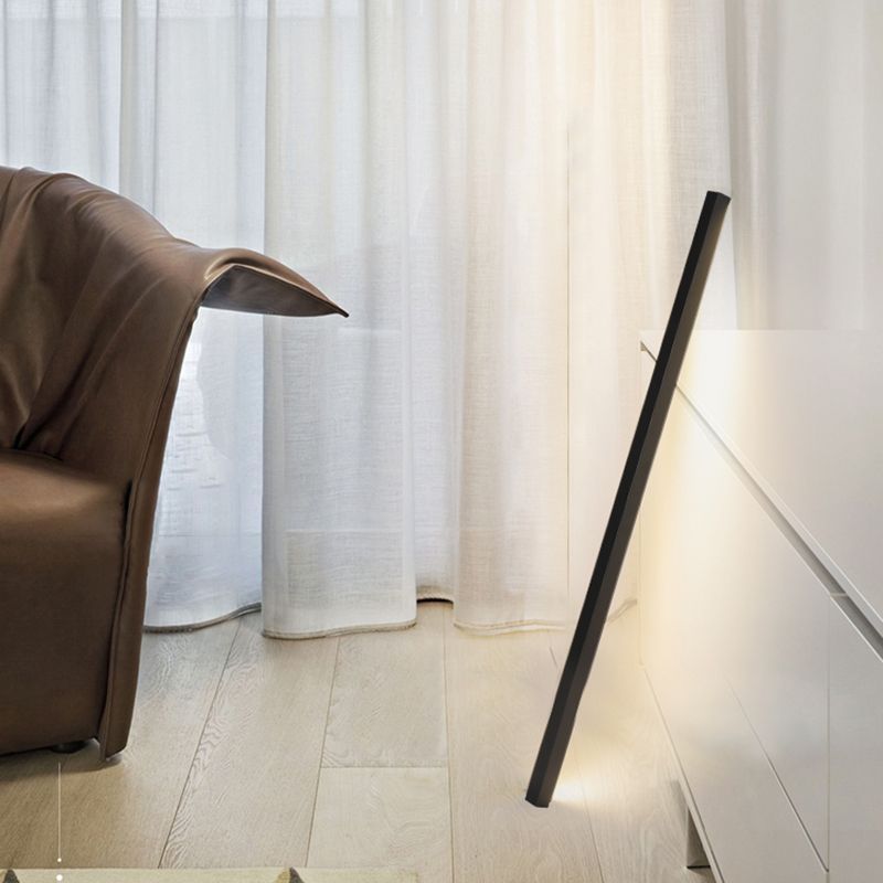 Minimalist black metal floor lamp in living room