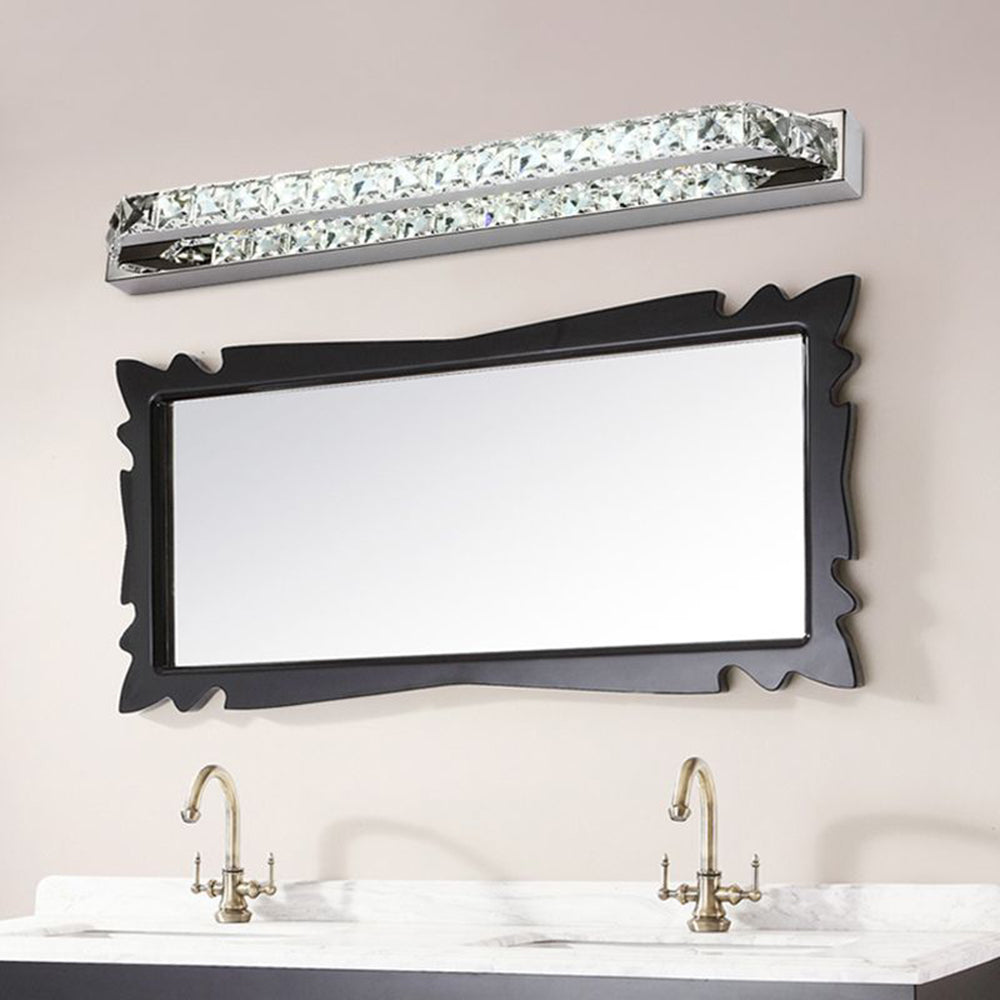 Bathroom vanity with crystal wall lamp and mirror