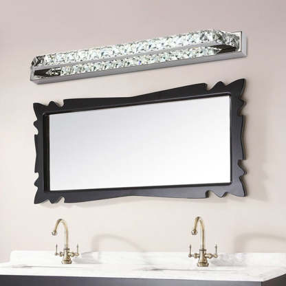 Bathroom vanity with crystal wall lamp and mirror