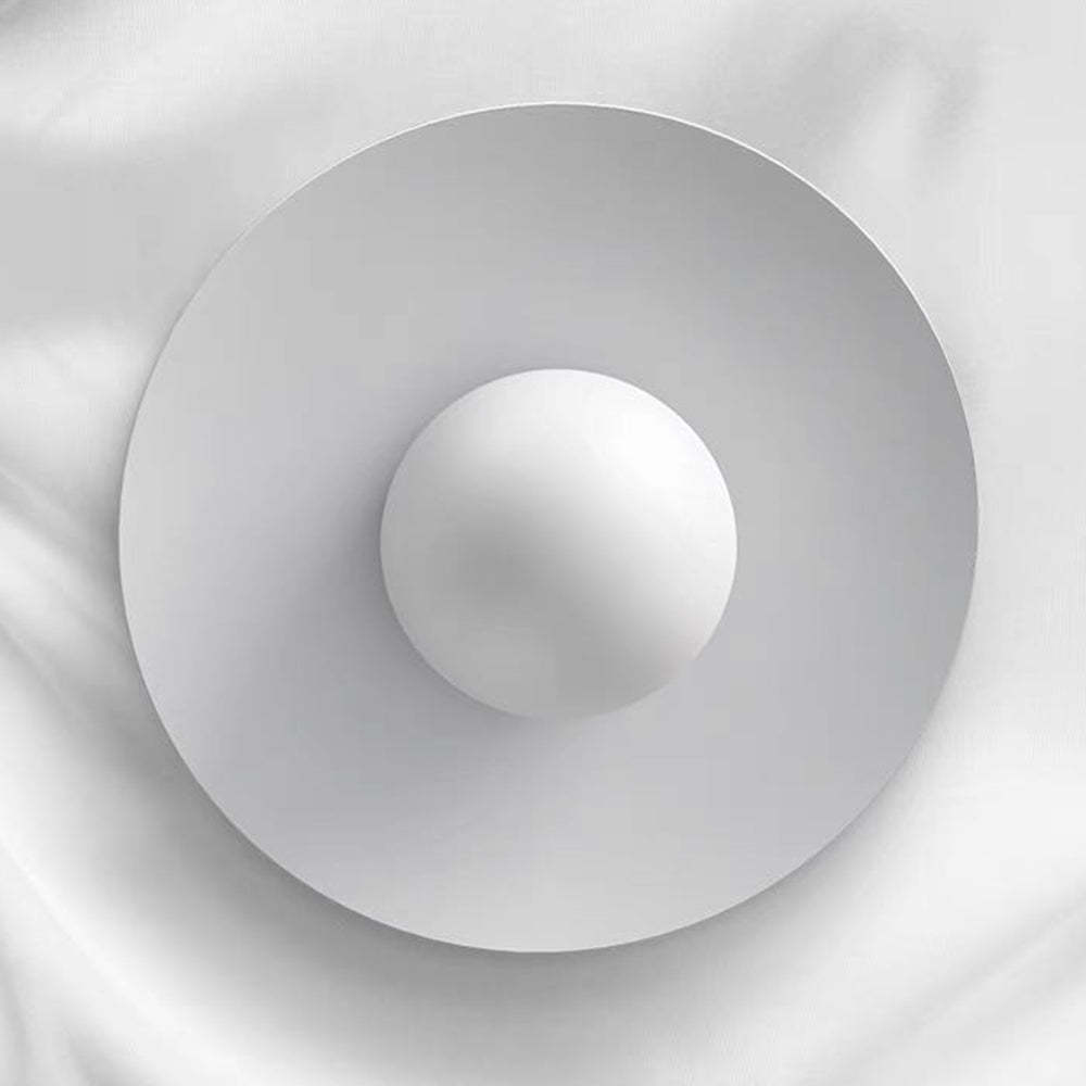 Abstract Carins chandelier globe detail on white fabric.